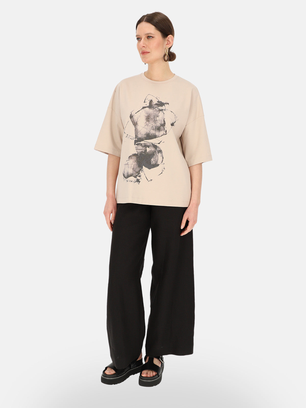 Beżowy T-shirt damski z artystycznym nadrukiem Eye For Fashion